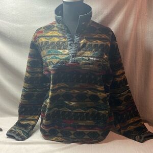 Obermeyer patterned  t-snap pullover shown on a size 6 mannequin